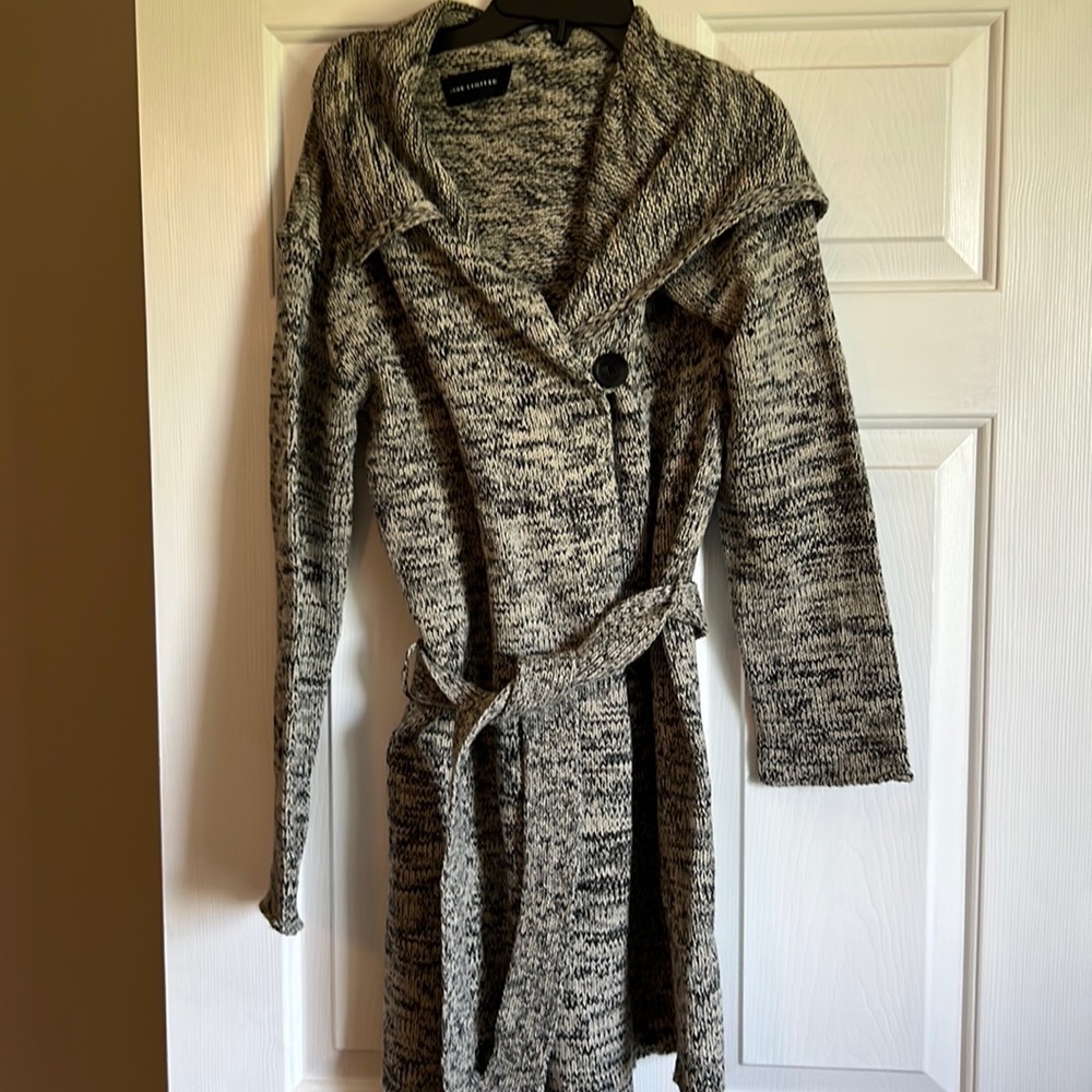 The limited inside button closure wrap sweater
